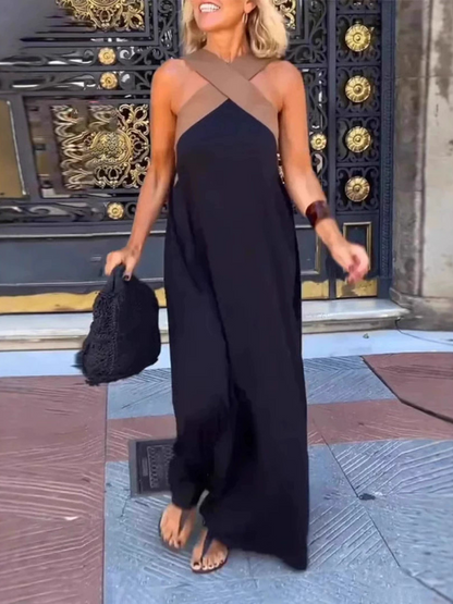 Vestido largo con espalda cruzada y caída fluida para invitada de boda – AYLA