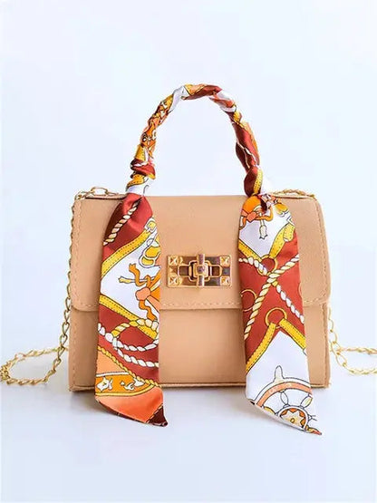 Bolso de mano elegante con cadena y pañuelo decorativo – CALISSA