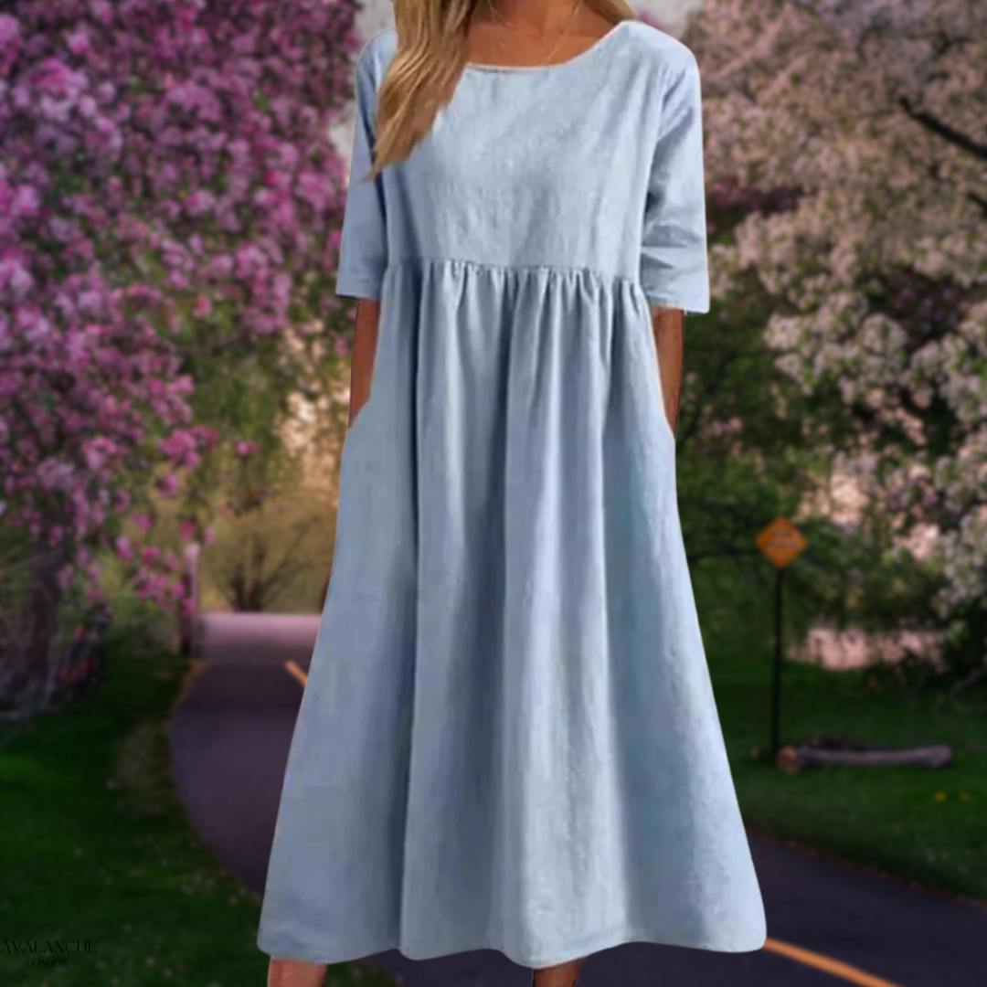 Vestido midi fluido de verano con manga media y corte cómodo – LINA SOL