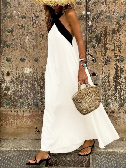 Vestido largo con espalda cruzada y caída fluida para invitada de boda – AYLA