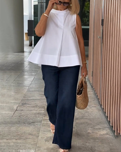 Top sin mangas de mujer con cuello alto y pliegue frontal – ELISARA