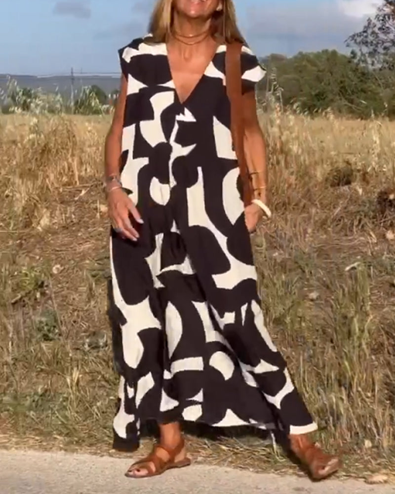 Vestido estampado con escote en V y corte fluido – STEPHARA