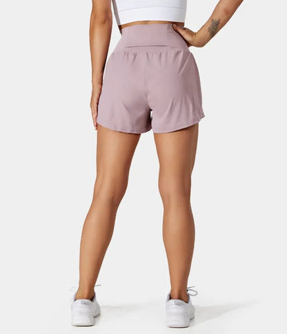 Short deportivo de mujer con cintura alta y bolsillos – DORA