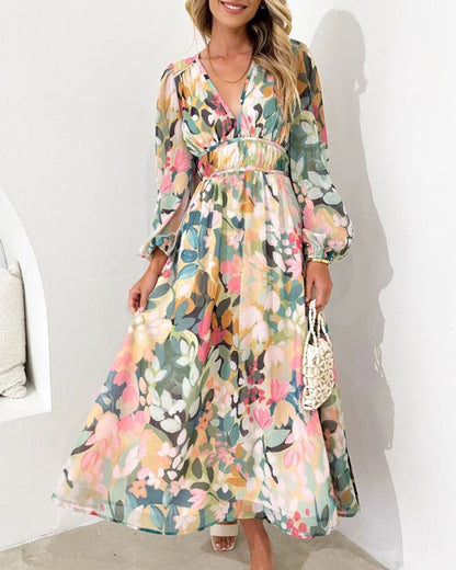 Vestido midi floral con vuelo romántico y escote cruzado – AMARELLA