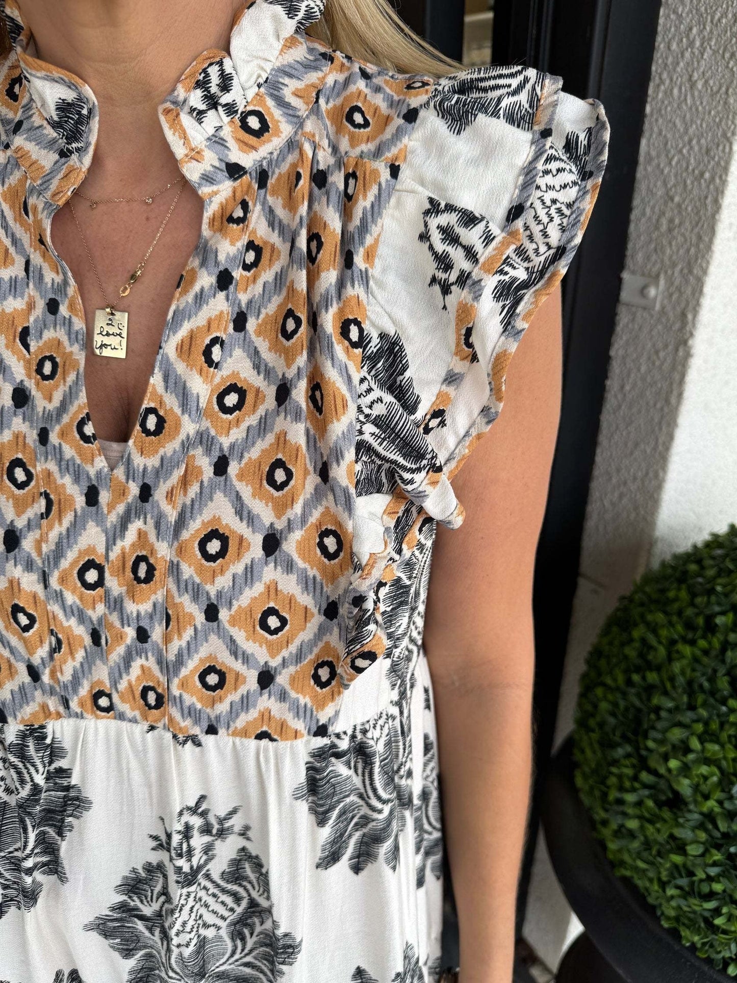 Vestido floral sin mangas con cuello de volantes para mujer – BIRGIT