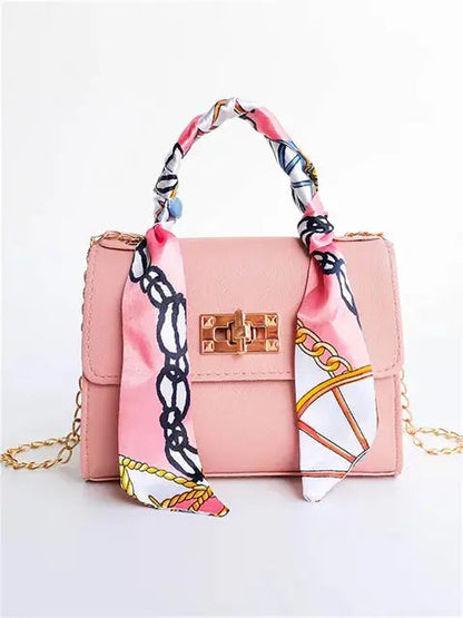 Bolso de mano elegante con cadena y pañuelo decorativo – CALISSA