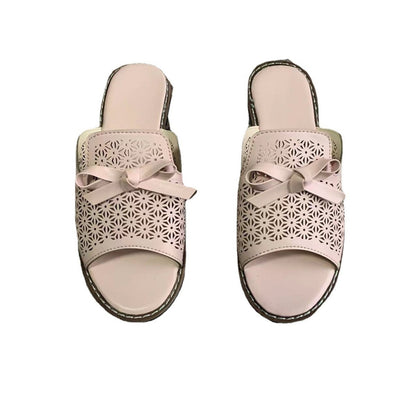 Slippers abiertas de mujer con perforaciones y lazo – FABIANA