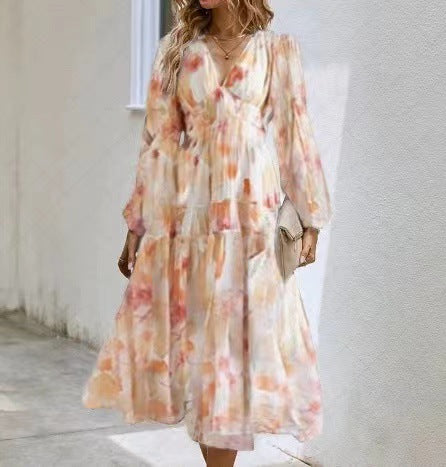 Vestido midi floral con vuelo romántico y escote cruzado – AMARELLA