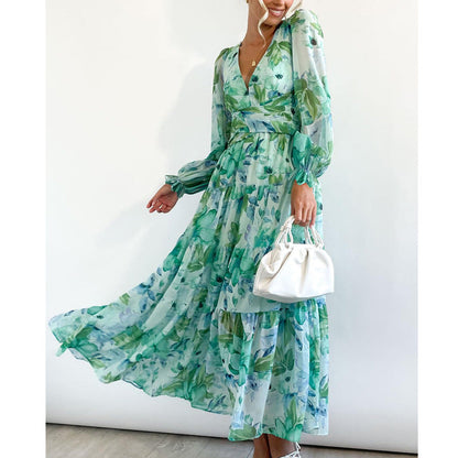 Vestido midi floral con vuelo romántico y escote cruzado – AMARELLA