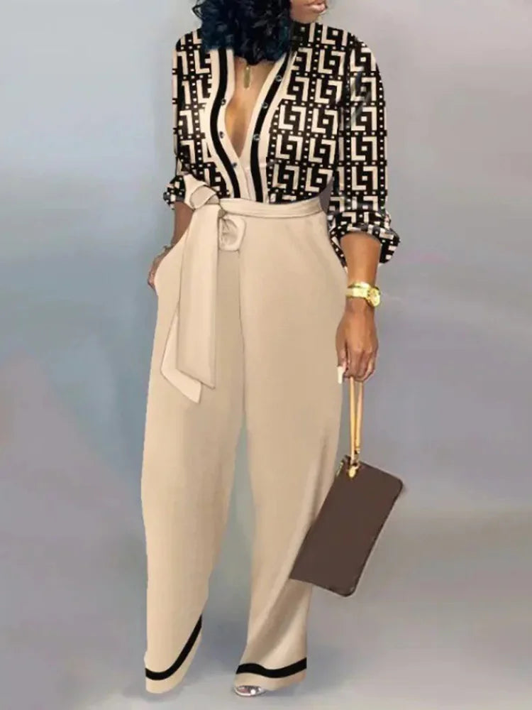 Mono largo y fluido con escote profundo y cinturón de lazo – SERENA