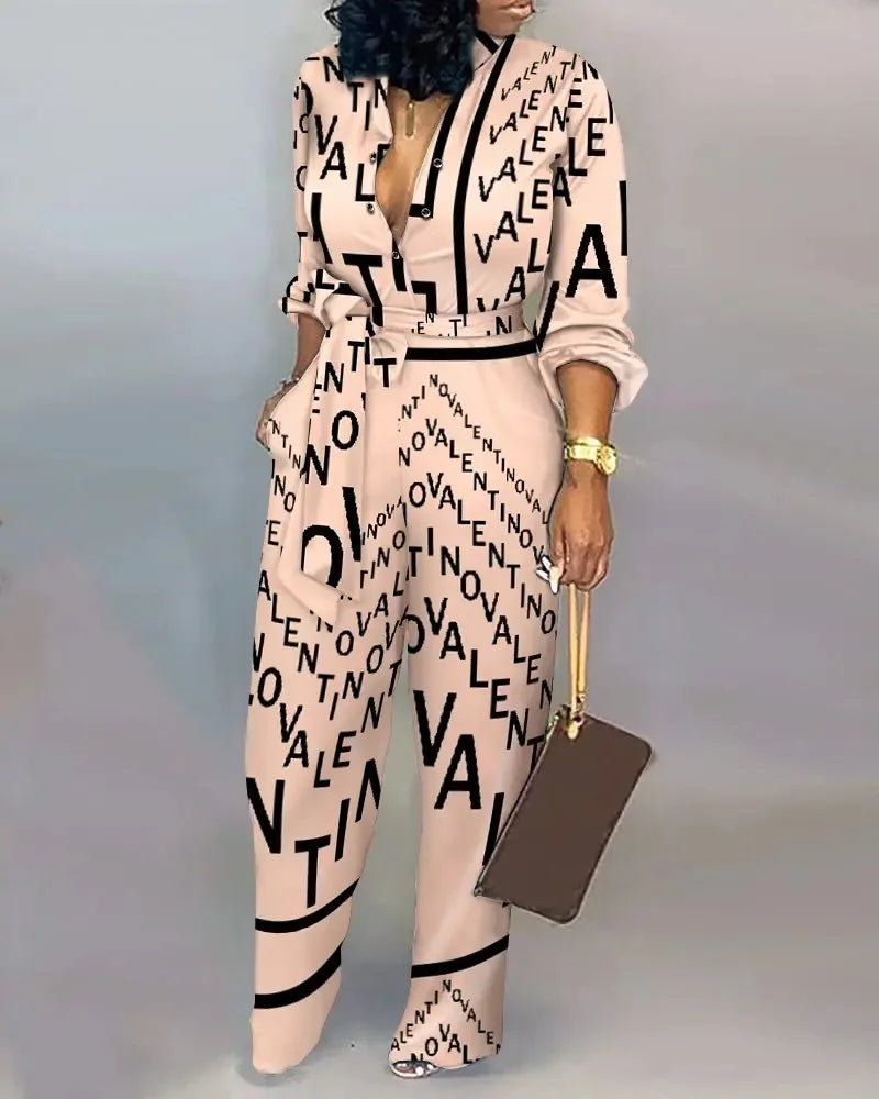 Mono largo y fluido con escote profundo y cinturón de lazo – SERENA