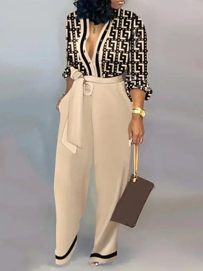 Mono largo y fluido con escote profundo y cinturón de lazo – SERENA