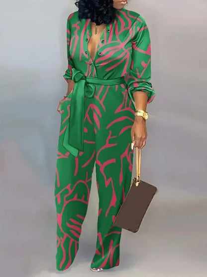 Mono largo y fluido con escote profundo y cinturón de lazo – SERENA