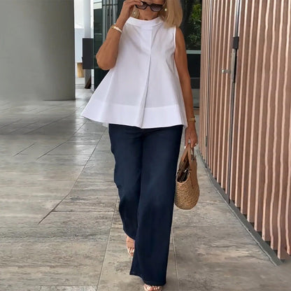 Top sin mangas de mujer con cuello alto y pliegue frontal – ELISARA