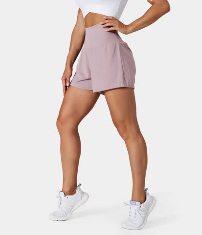 Short deportivo de mujer con cintura alta y bolsillos – DORA