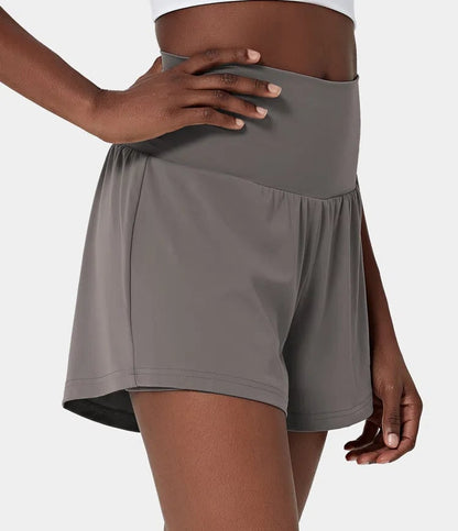 Short deportivo de mujer con cintura alta y bolsillos – DORA