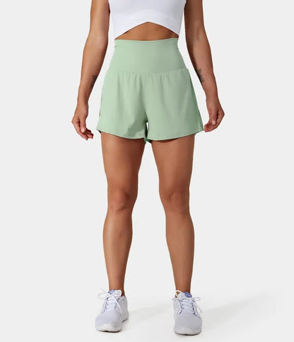 Short deportivo de mujer con cintura alta y bolsillos – DORA
