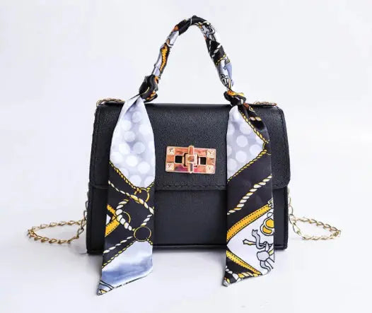 Bolso de mano elegante con cadena y pañuelo decorativo – CALISSA