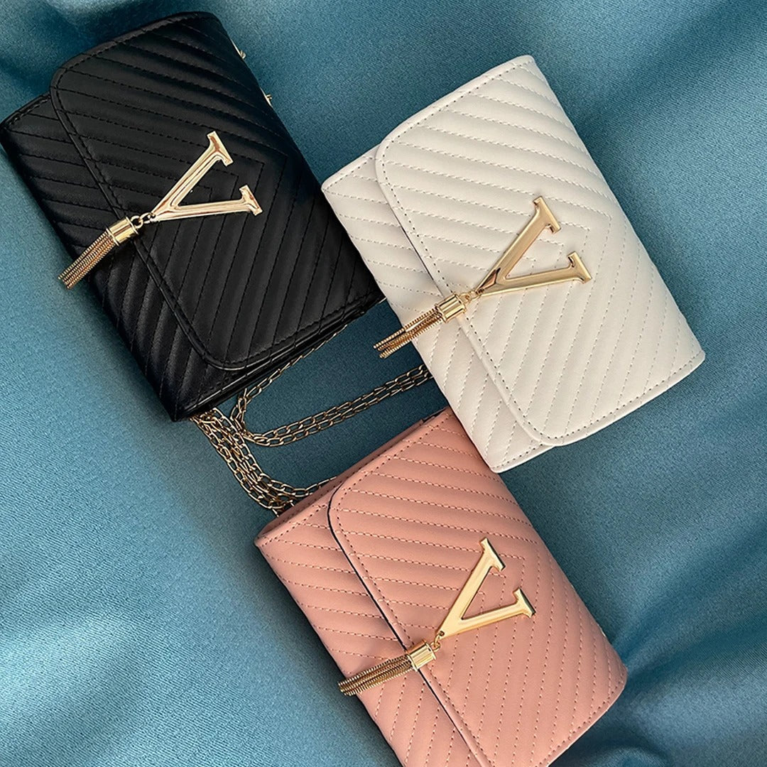 Bolso de mano con borla decorativa y diseño moderno – GLAMIRA