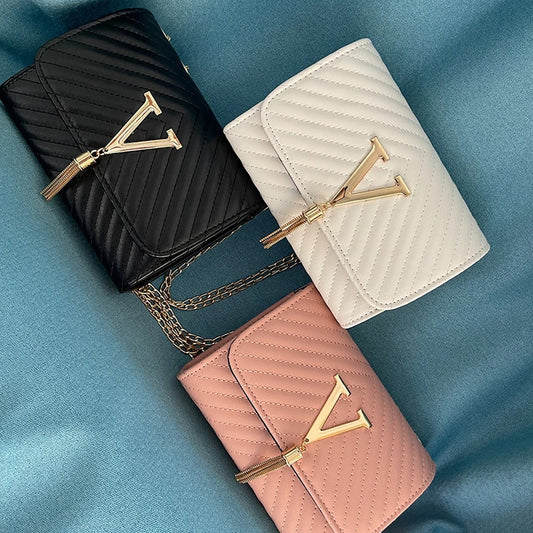 Bolso de mano con borla decorativa y diseño moderno – GLAMIRA